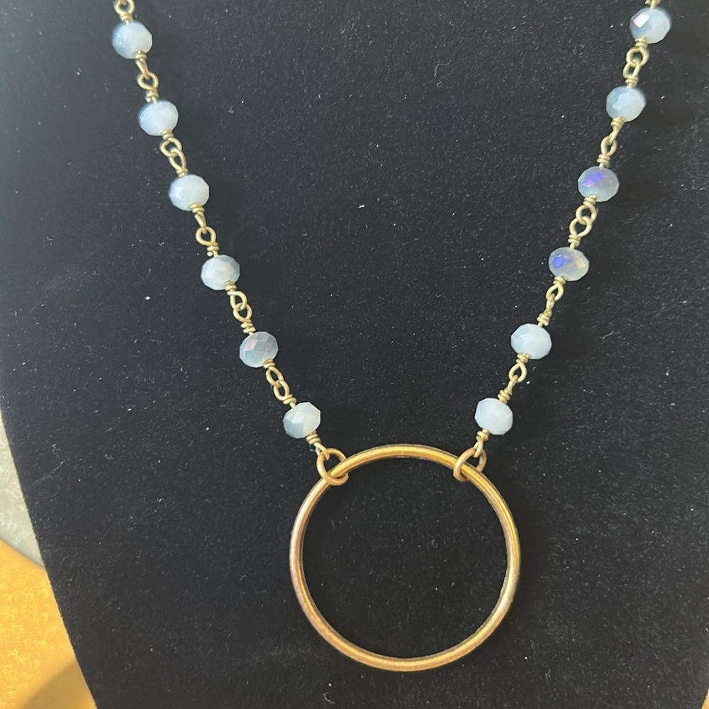 Blue Beaded Necklace 17” Long with Gold colored Circle Pendant; Very Pretty!